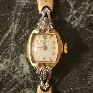 Bulova N2 10k rolled gold watch with diamonds.